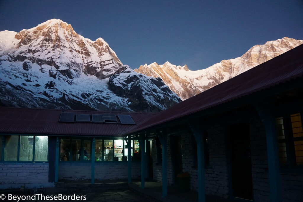 View of Annapurnas above our lodge at basecamp early in the morning.  The sky is clear and still dark.