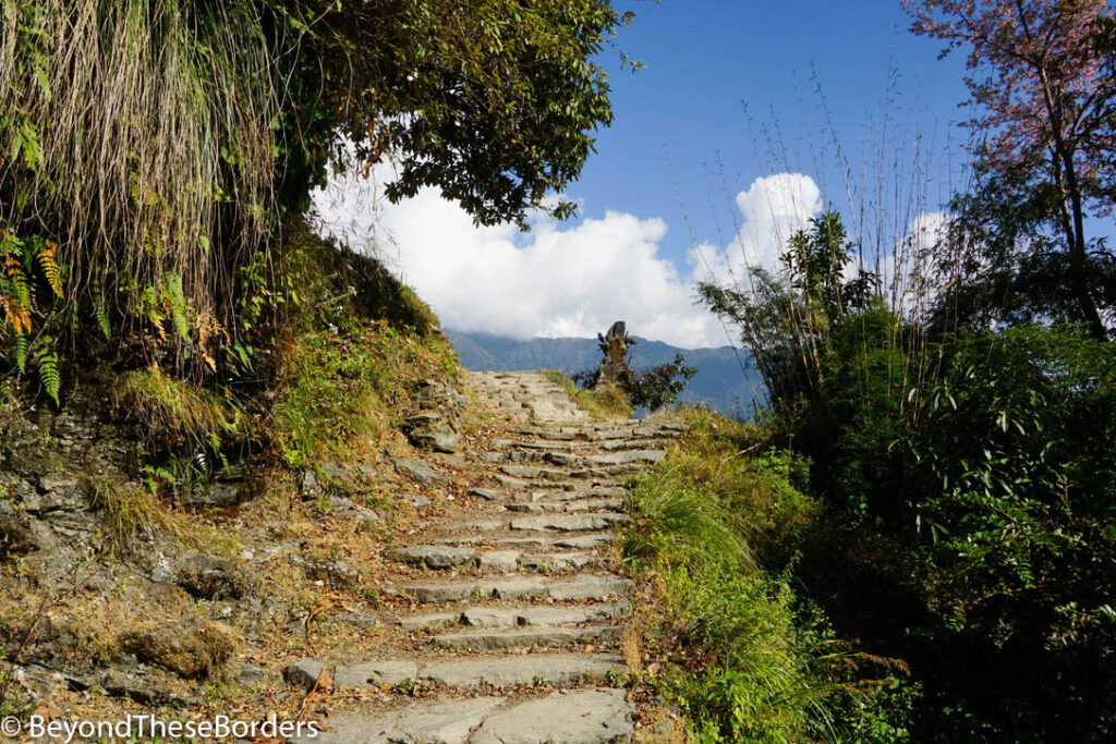 Stone stairs that look like they lead up to the clouds.