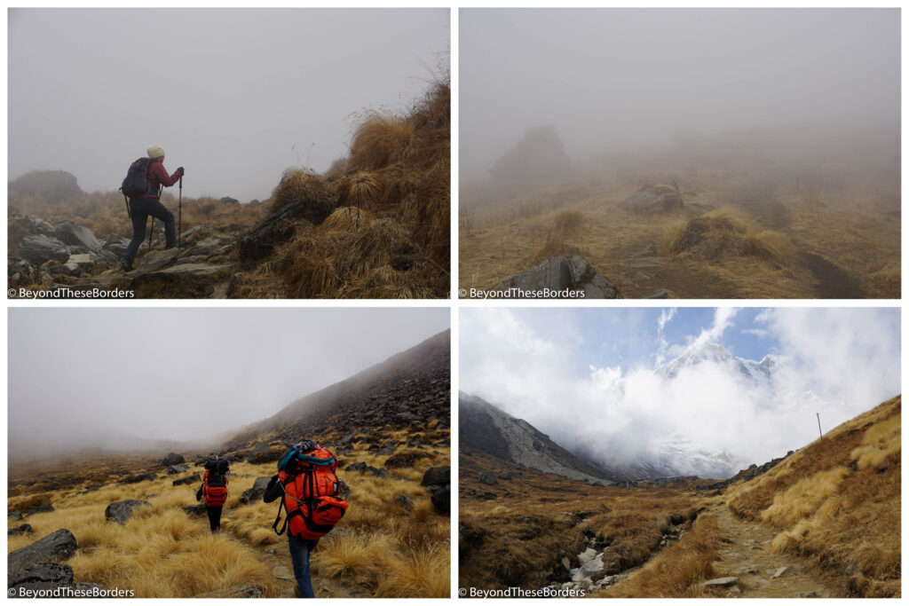 4 photos.  1:  I'm hiking up the trail into the mist.  Rocks and grass cover the ground.  2:  The fog is so thick that the trail is hardly visible. 3:  Porters carrying large red bags walk along the trail between long yellow grass.  Large dark rocks scattered around the landscape and fog in the distance.  4:  The sky is clearing up.  The trail is leading to giant white mountains that are 80% covered by clouds.