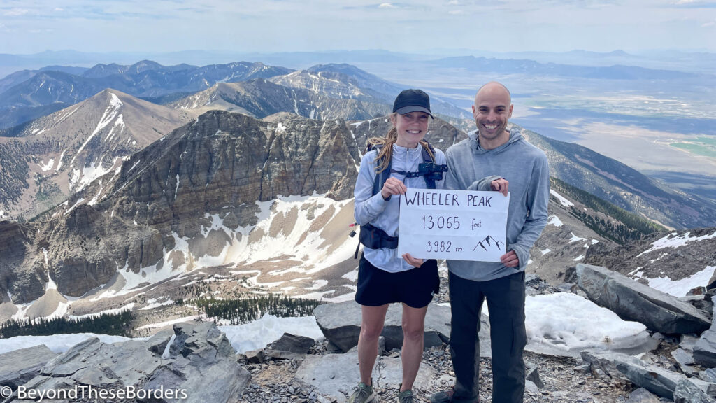 My partner and I posing with the Wheeler Peak sign.